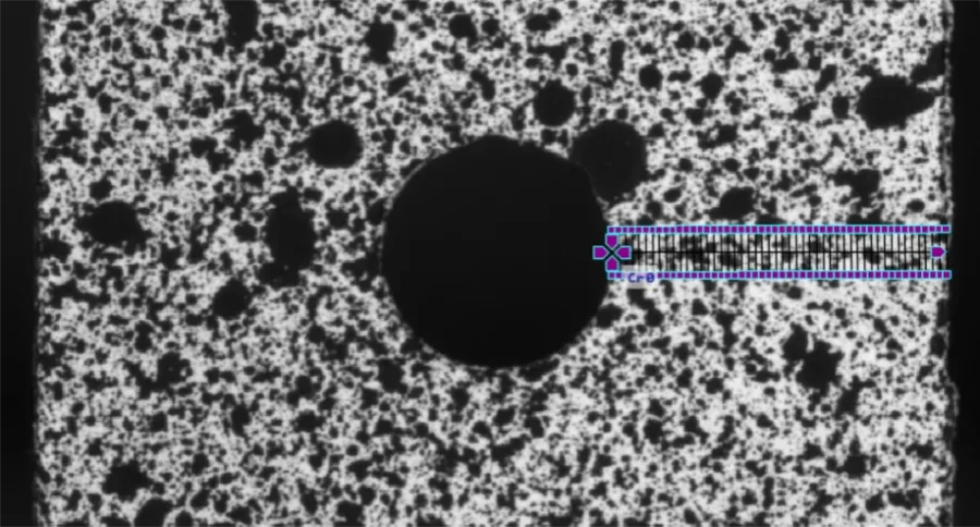 STRAIN CONCENTRATION ON A NOTCHED SAMPLE: DIC VS. FEM 7 4 4